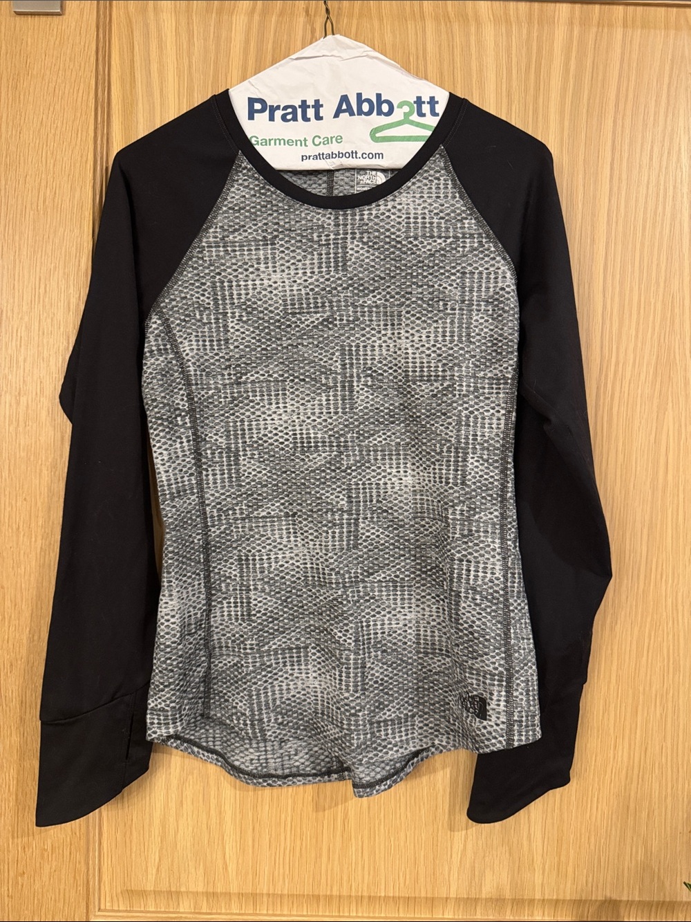 The North Face Women's Black Raglan Long-Sleeve Top with Gray Patterned Body